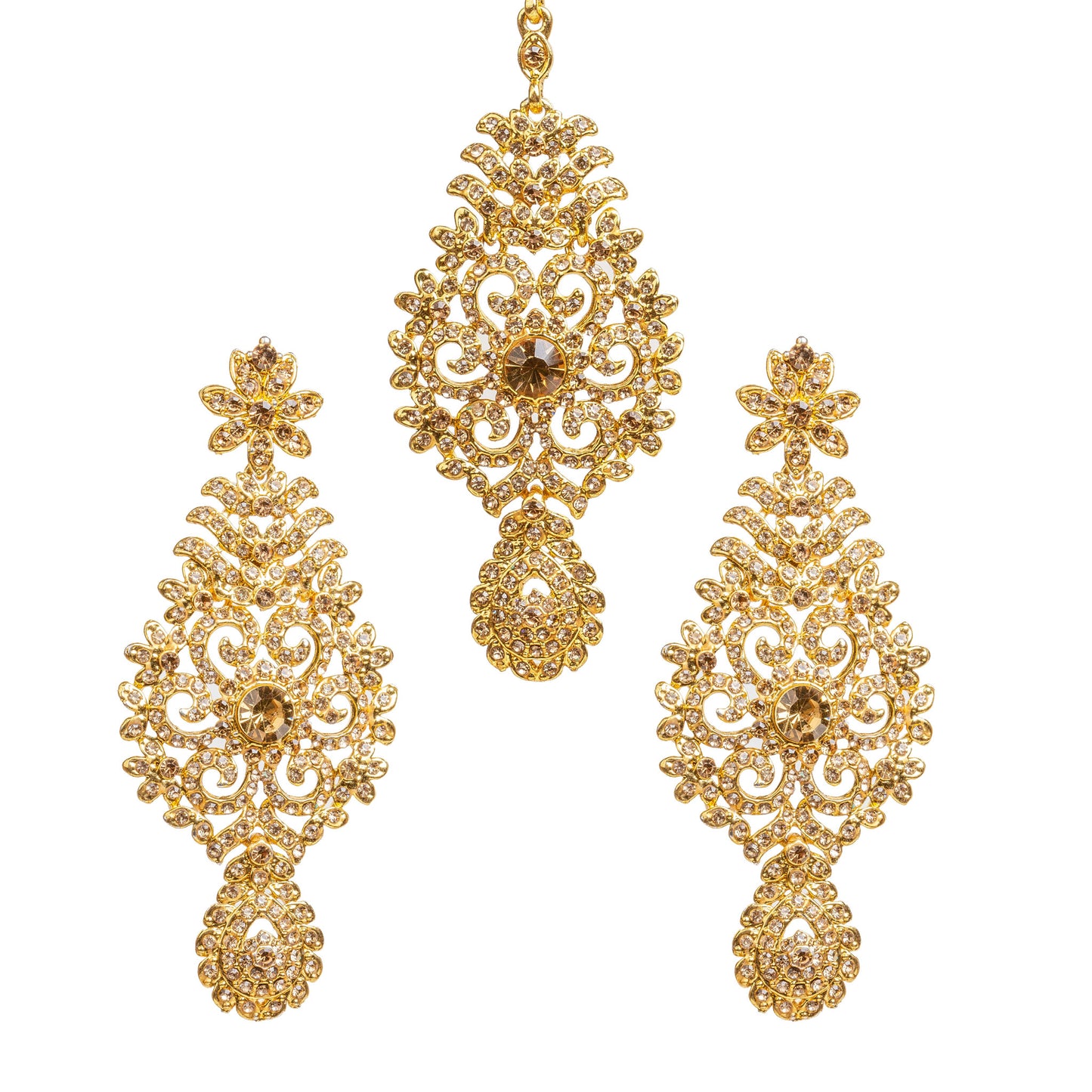 Bindhani gold-plated earrings and maang tikka set embellished with champagne-colored LCT stones and sparkling crystal accents. The earrings feature a floral top, intricate leaf and scrollwork design with a central round LCT stone, and an elegant teardrop-shaped LCT stone-studded bottom drop. The matching maang tikka showcases a coordinating ornate floral design with a central round LCT stone and a teardrop-shaped LCT stone-studded bottom drop. Front view displayed on a white background.