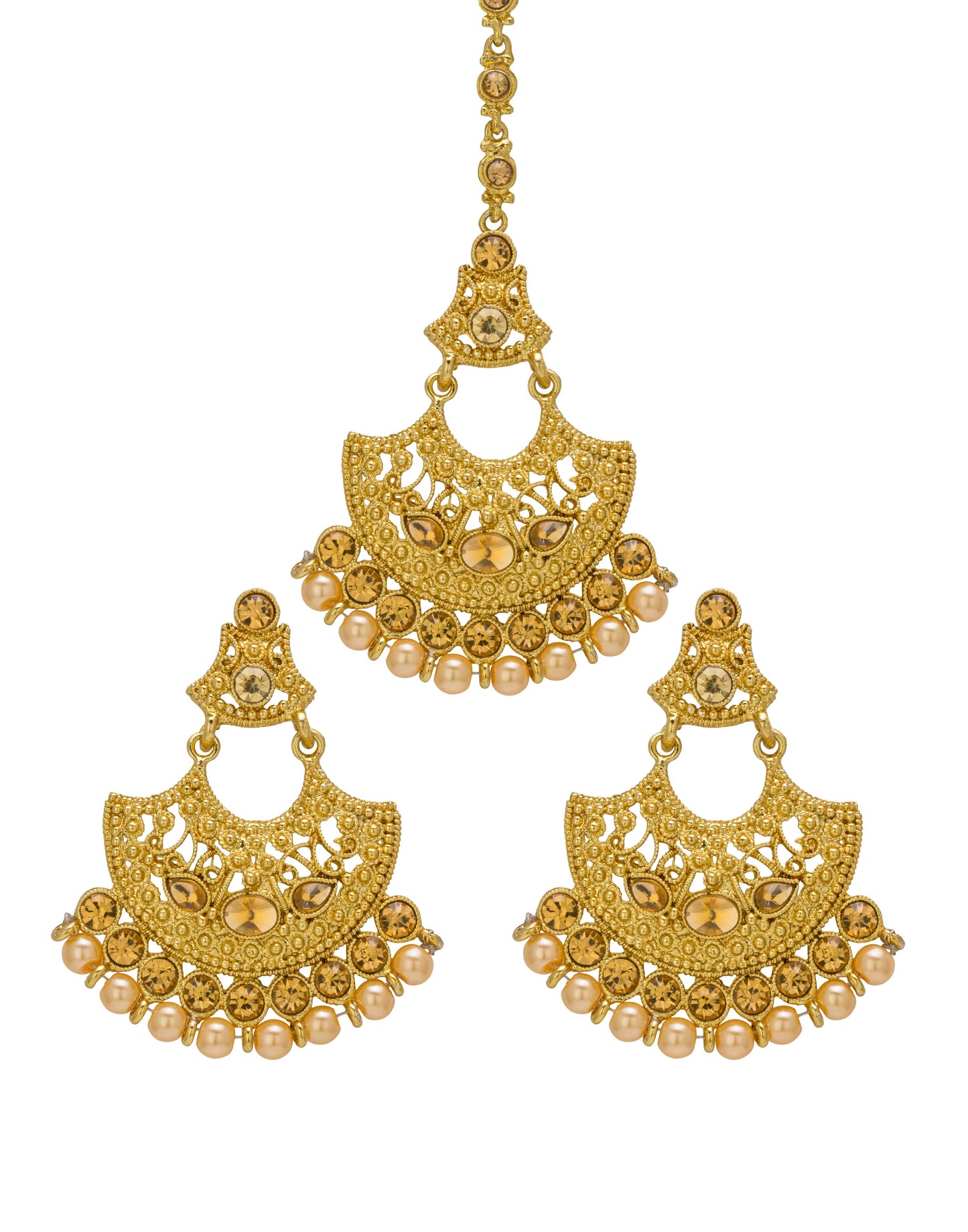 Bindhani gold-plated earrings and maang tikka set featuring intricate filigree detailing with champagne-colored stones and pearl drop accents. The earrings showcase an open crescent-shaped design with ornate lattice work, marquise-shaped stone motifs, round champagne-colored stones, and multiple pearl hanging drops. The matching maang tikka features a coordinating open crescent design with intricate filigree patterns, champagne-colored stones, and pearl drop embellishments. Front view displayed 