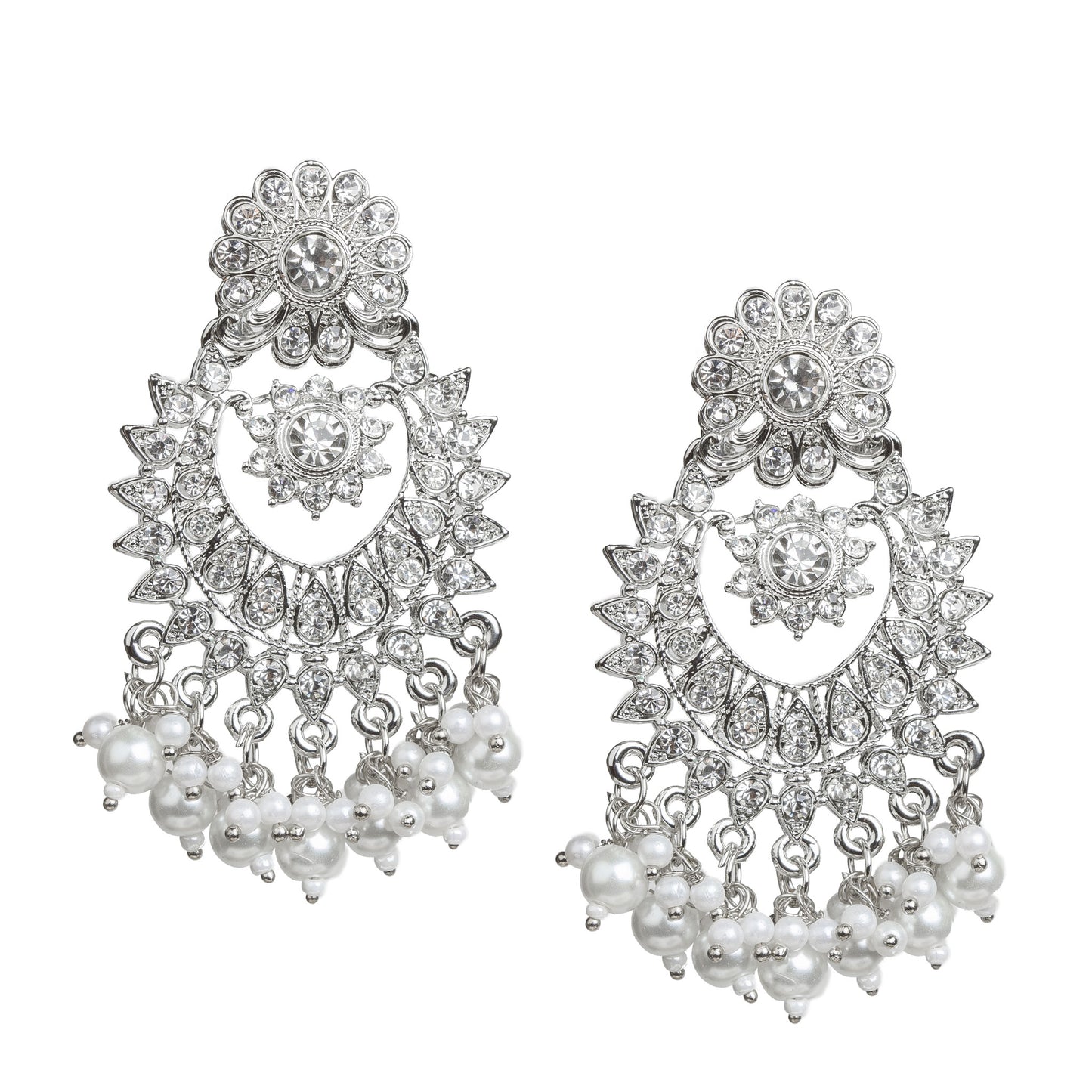 Bindhani silver-plated chandbali earrings featuring intricate floral and crescent-shaped designs adorned with clear stones. The earrings have a floral stud top, an ornate floral centerpiece, detailed openwork, and white pearl bead tassels along the bottom edge. Front view displayed on a white background.