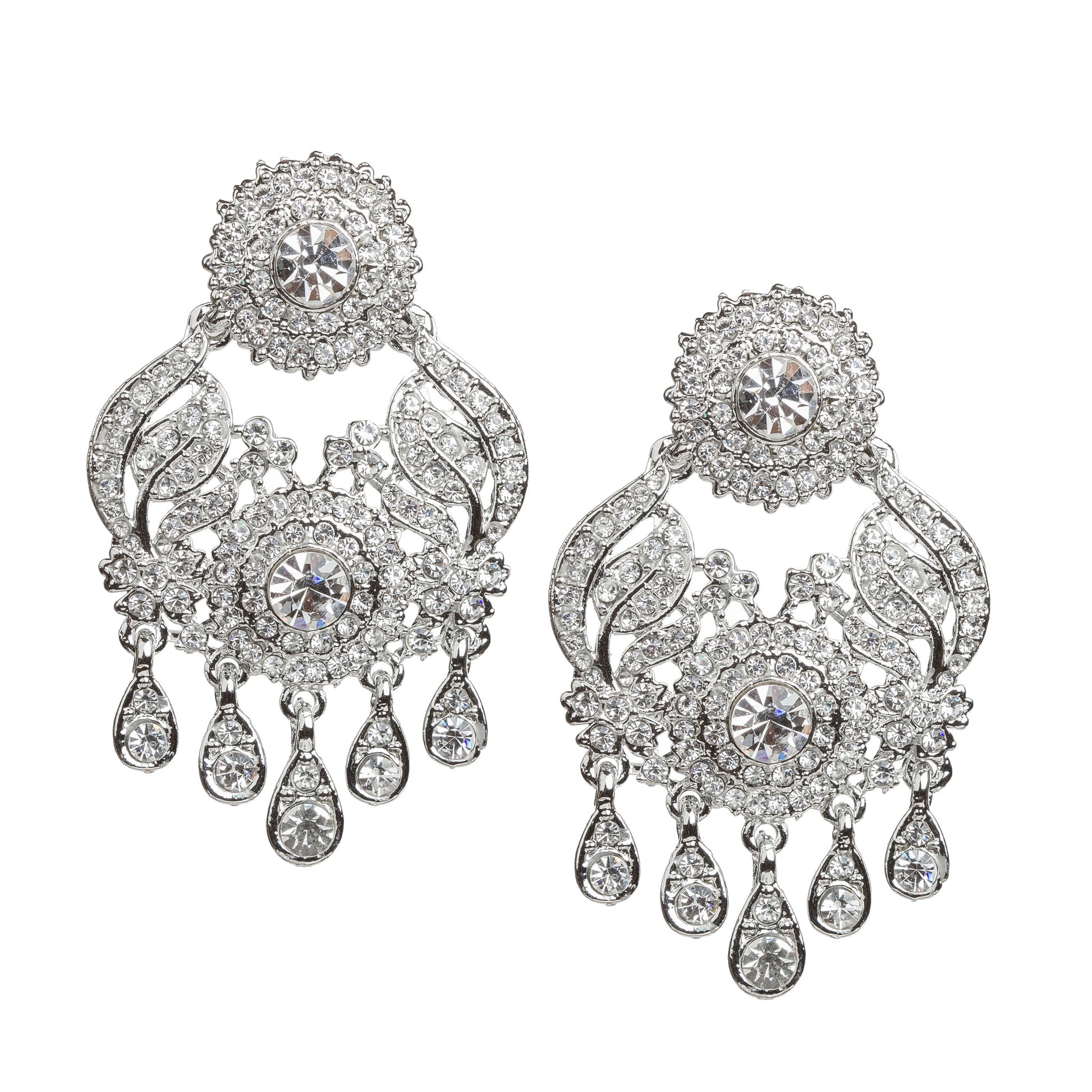 Bindhani silver-plated statement earrings featuring a round floral stud top with intricate openwork detailing and clear stone embellishments. The earrings showcase a curved ornamental design with a central round stone, delicate floral patterns, and multiple teardrop-shaped stone danglers. Front view displayed on a white background.