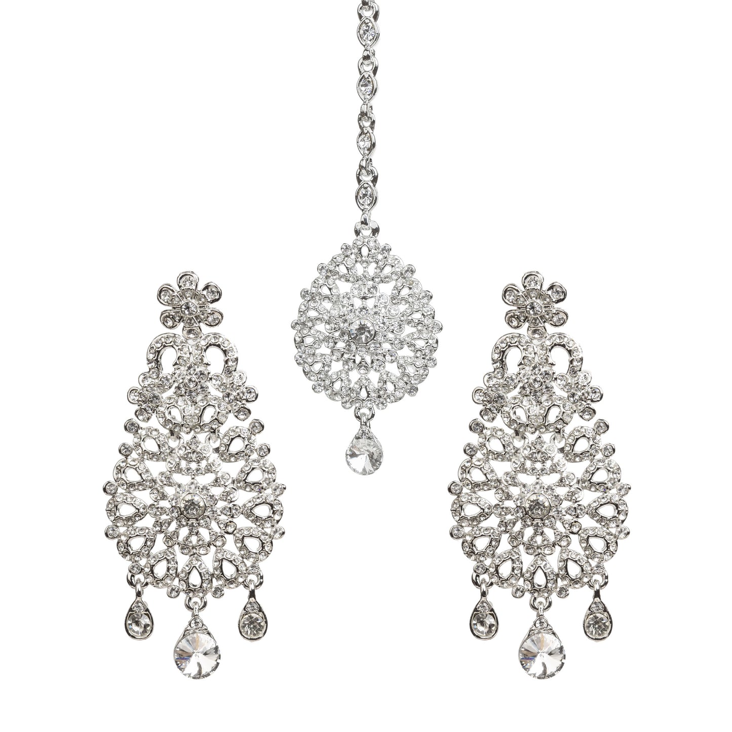Bindhani silver-toned earrings and maang tikka set embellished with clear stones and intricate floral filigree detailing. The earrings feature a floral stud, ornate openwork teardrop-shaped design with a central floral motif, and three dangling clear stone charms, including a larger center teardrop. The matching maang tikka showcases a coordinating floral teardrop design with a single dangling clear teardrop stone. Front view displayed on a white background.