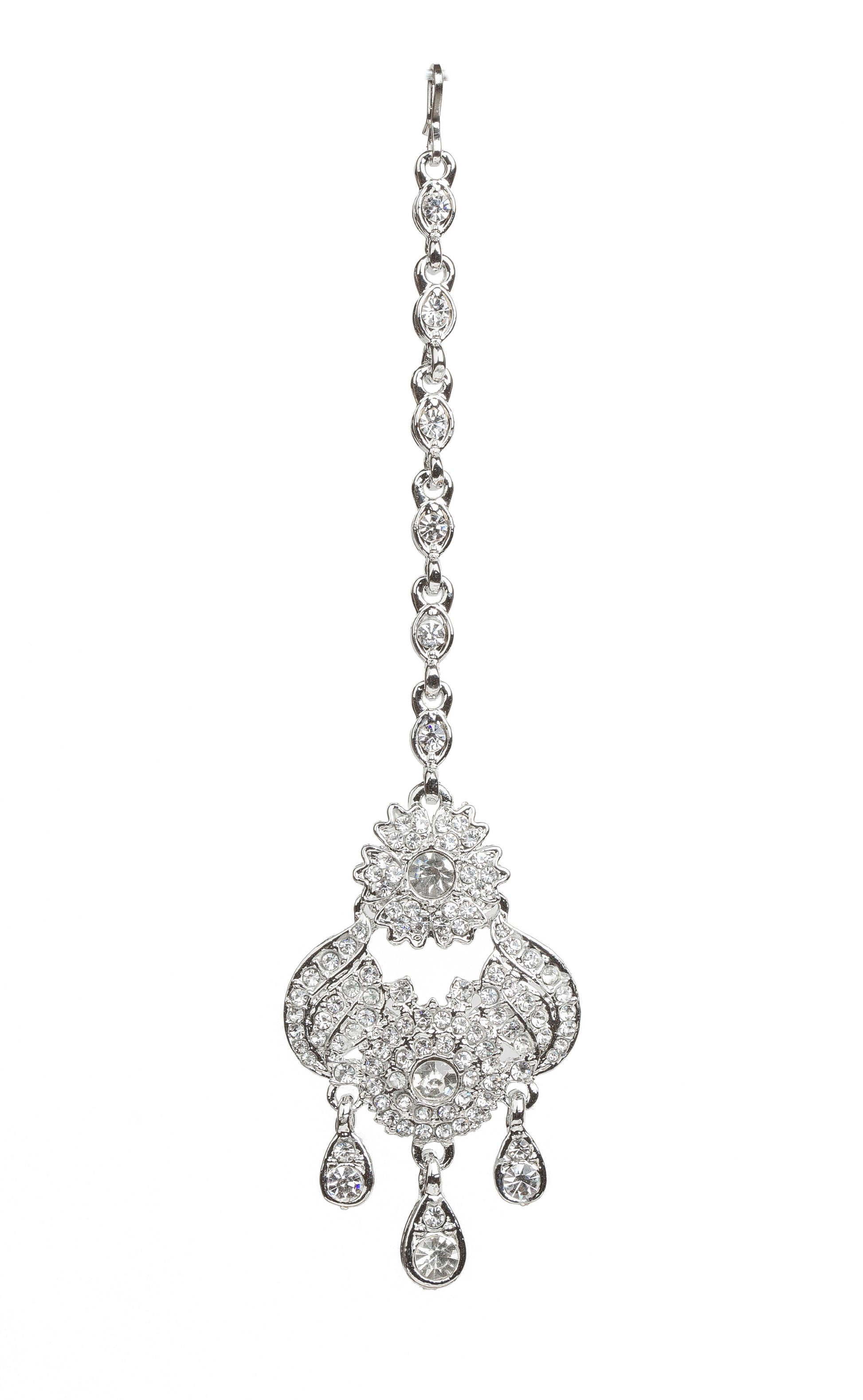 Bindhani silver-plated maang tikka featuring an intricate floral and paisley-inspired design embellished with clear stones. The tikka showcases a central floral motif, curved decorative detailing, and multiple teardrop-shaped stone danglers. Attached to a delicate silver-toned chain. Front view displayed on a white background.
