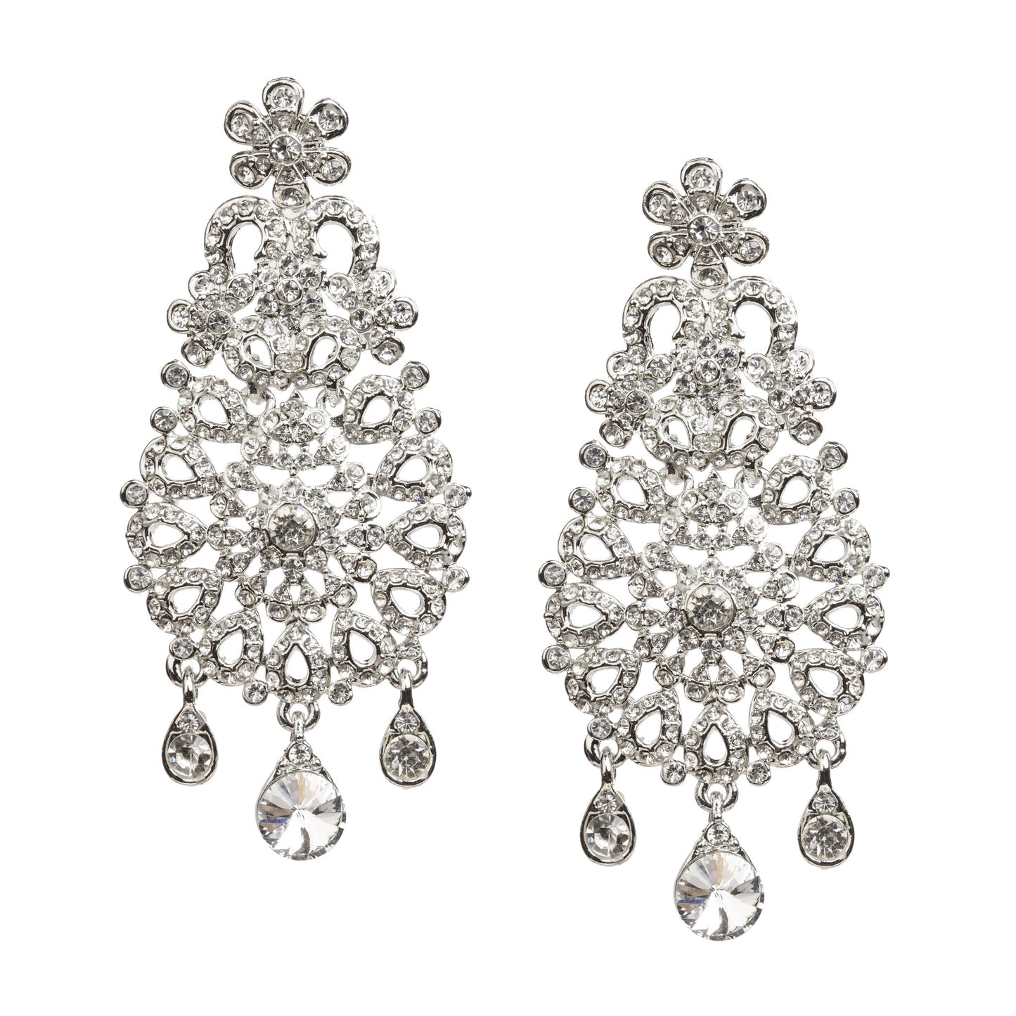 Bindhani silver-toned statement earrings embellished with clear stones and intricate floral filigree detailing. Each earring features a floral stud, an ornate openwork teardrop-shaped design with a sparkling central floral motif, and three dangling clear stone charms with a larger teardrop stone at the center. Front view displayed on a white background.