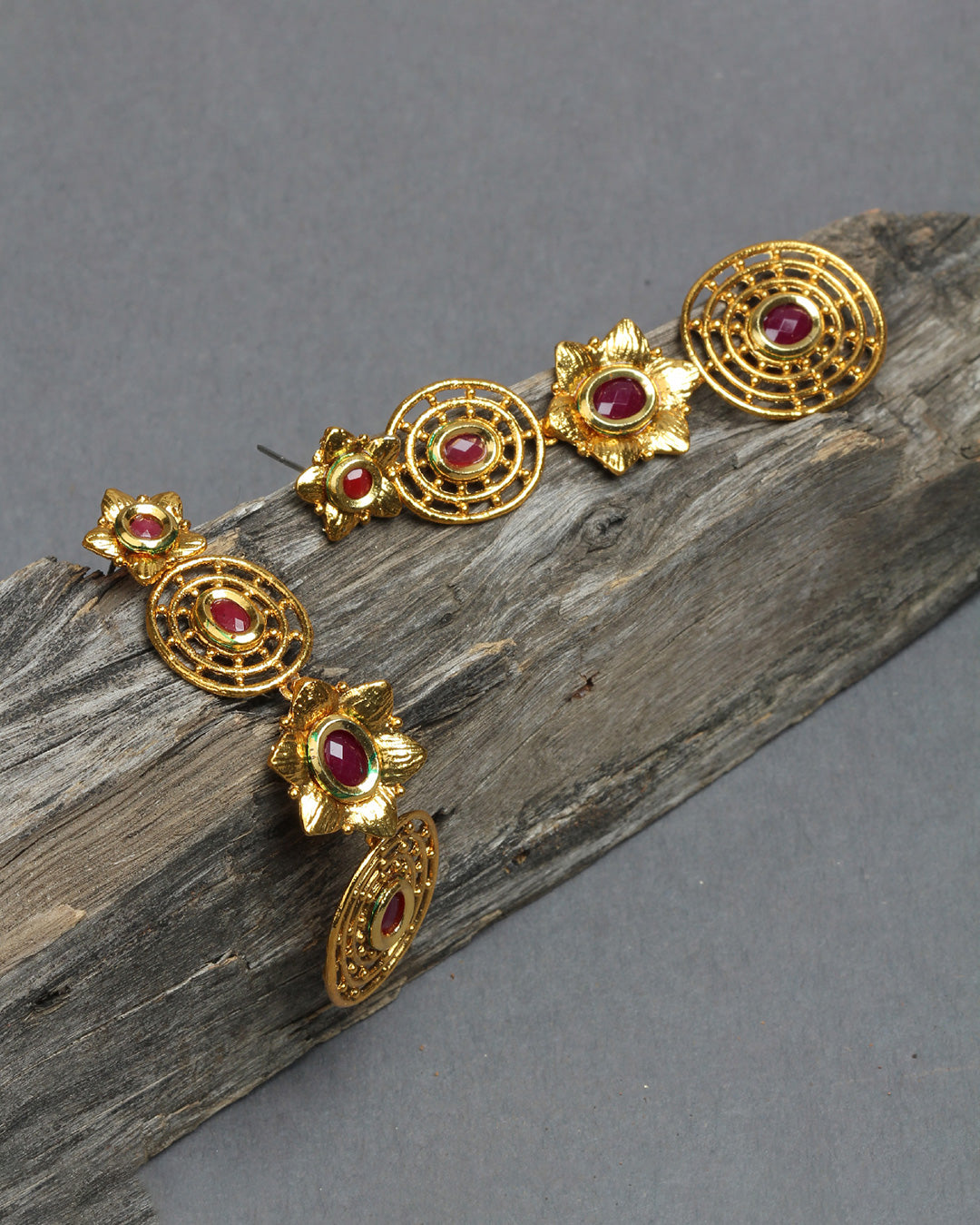 Bindhani gold plated red stone copper dangle blossom earrings secured with post back closure for women and girls